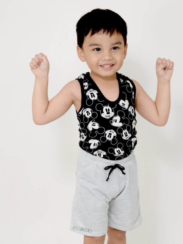 Cute boy wearing cotton tank top