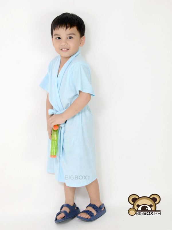 boy child in bathrobe baby blue